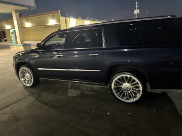 285/45R22 White/Blue tires on a 2018 CADILLAC ESCALADE PREMIUM LUXURY