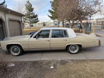 215/70R15 White/Gold tires on a 1985 Cadillac Fleetwood brougham D'Elegance