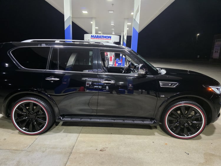 305/35R24 White/Red tires on a 2019 INFINITI QX80 LUXE