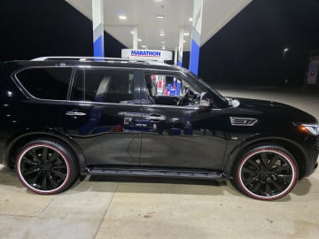 305/35R24 White/Red tires on a 2019 INFINITI QX80 LUXE