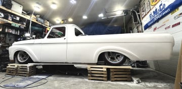 215/70R15 White/Red tires on a 1062 Mercury M100