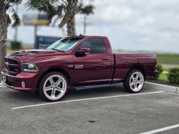 285/45R22 White/Red tires on a 2017 RAM TRUCK 1500 SPORT