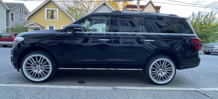 285/45R22 White/Blue tires on a 2023 FORD EXPEDITION LIMITED