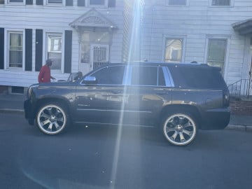 285/45R22 White/Gold tires on a 2016 GMC YUKON 1500 DENALI