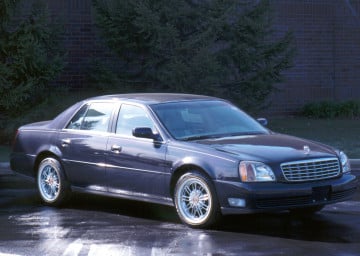 235/60R16 White/Gold tires on a 2001 CADILLAC DE VILLE