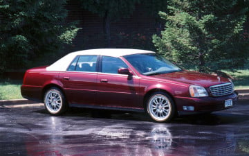 235/60R16 White/Gold tires on a 2001 CADILLAC DE VILLE