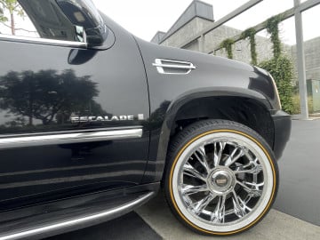 285/45R22 White/Gold tires on a 2007 CADILLAC ESCALADE 2WD -4WD