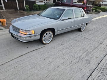 235/55R17 White/Gold tires on a 1994 CADILLAC DE VILLE