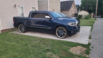 305/35R24 White/Gold tires on a 2021 RAM TRUCK 1500 6 LUG