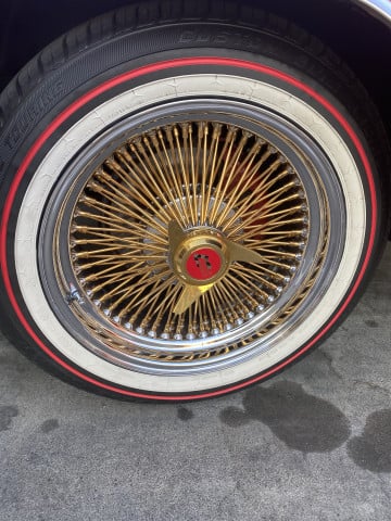 Vogue 235/55R17 White/Red tires on a 1970 OLDSMOBILE 98