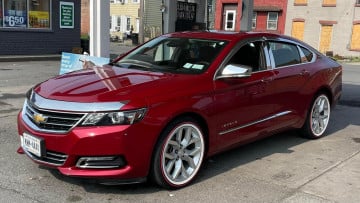 Vogue 245/45R19 White/Red tires on a 2014 CHEVROLET IMPALA LTZ