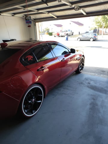 Vogue 245/45R20 White/Red tires on a 2017 JAGUAR XE R-SPORT