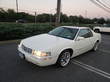 Vogue 225/60R16 White/Gold tires on a 1997 CADILLAC ELDORADO