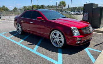 Vogue 265/35R22 White/Gold tires on a 2006 CADILLAC STS W-OE 18