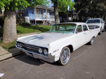 Vogue 245/45R20 White/Gold tires on a 1964 Oldsmobile Jetstar 88