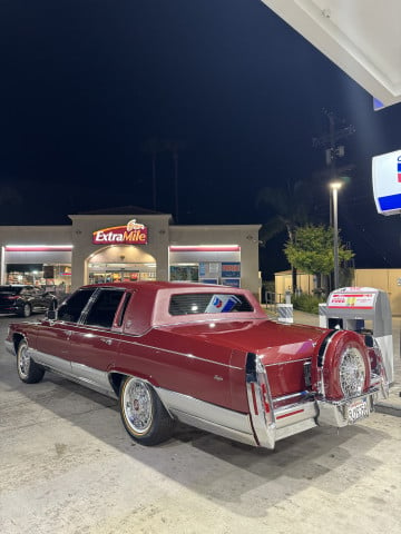 Vogue 235/70R15 White/Gold tires on a 1990 Cadillac Brougham