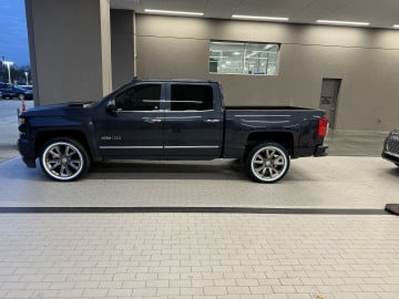 Vogue 285/45R22 White/Blue tires on a 2018 Chevrolet Silverado Centennial 2LTZ