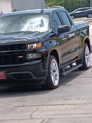 Vogue 275/55R20 White/Red tires on a 2021 CHEVROLET SILVERADO 1500 CUSTOM