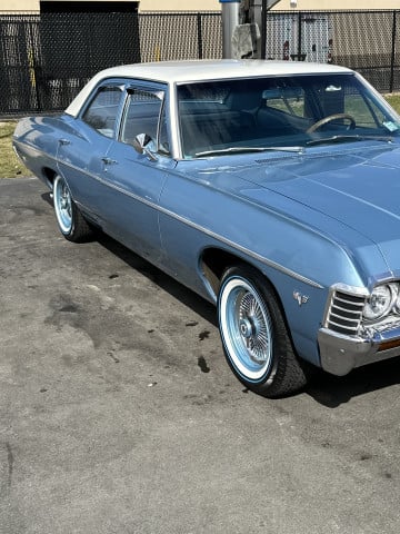 Vogue 215/70R15 White/Blue tires on a 1967 Chevrolet Belair