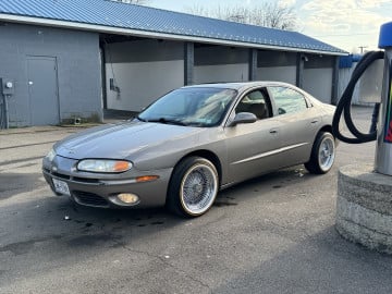 Vogue 235/50R17 White/Gold tires on a 2001 OLDSMOBILE AURORA