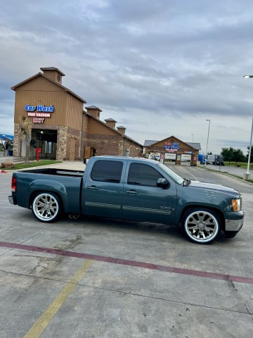 Vogue 285/45R22 White/Blue tires on a 2008 GMC SIERRA 1500 2WD -4WD