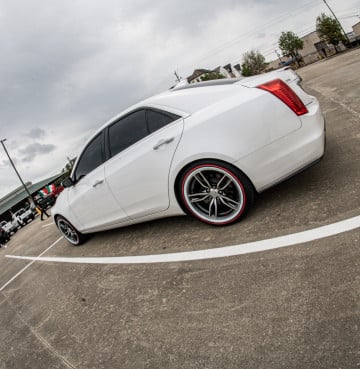 235/50R18 White/Red tires on a 2018 CADILLAC CTS LUXURY