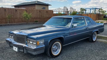 Vogue 235/70R15 White/Gold tires on a 1977 Cadillac Coupe deville