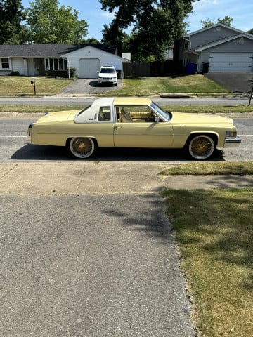 Vogue 265/35R22 White/Gold tires on a 1979 Cadillac Coupe deVille