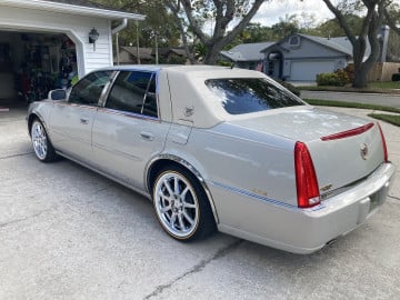 Vogue 245/45R18 White/Gold tires on a 2007 CADILLAC DTS