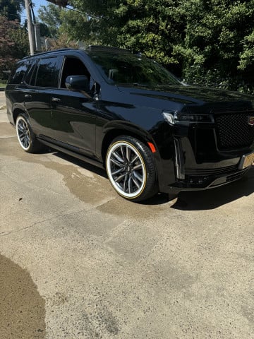 Vogue 275/50R22 White/Gold tires on a 2021 CADILLAC ESCALADE SPORT