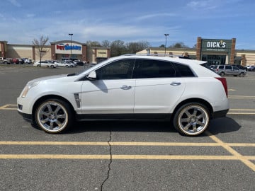 235/55R20 White/Gold tires on a 2012 CADILLAC SRX LUXURY