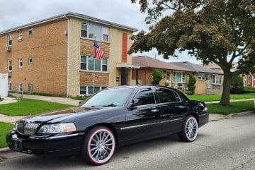 245/40R20 White/Red tires on a 2011 LINCOLN TOWN CAR