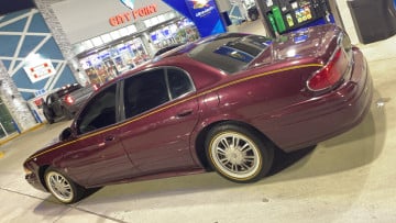 Vogue 215/65R15 White/Gold tires on a 2003 BUICK LE SABRE
