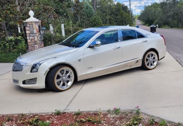 235/50R17 White/Gold tires on a 2013 CADILLAC ATS SEDAN