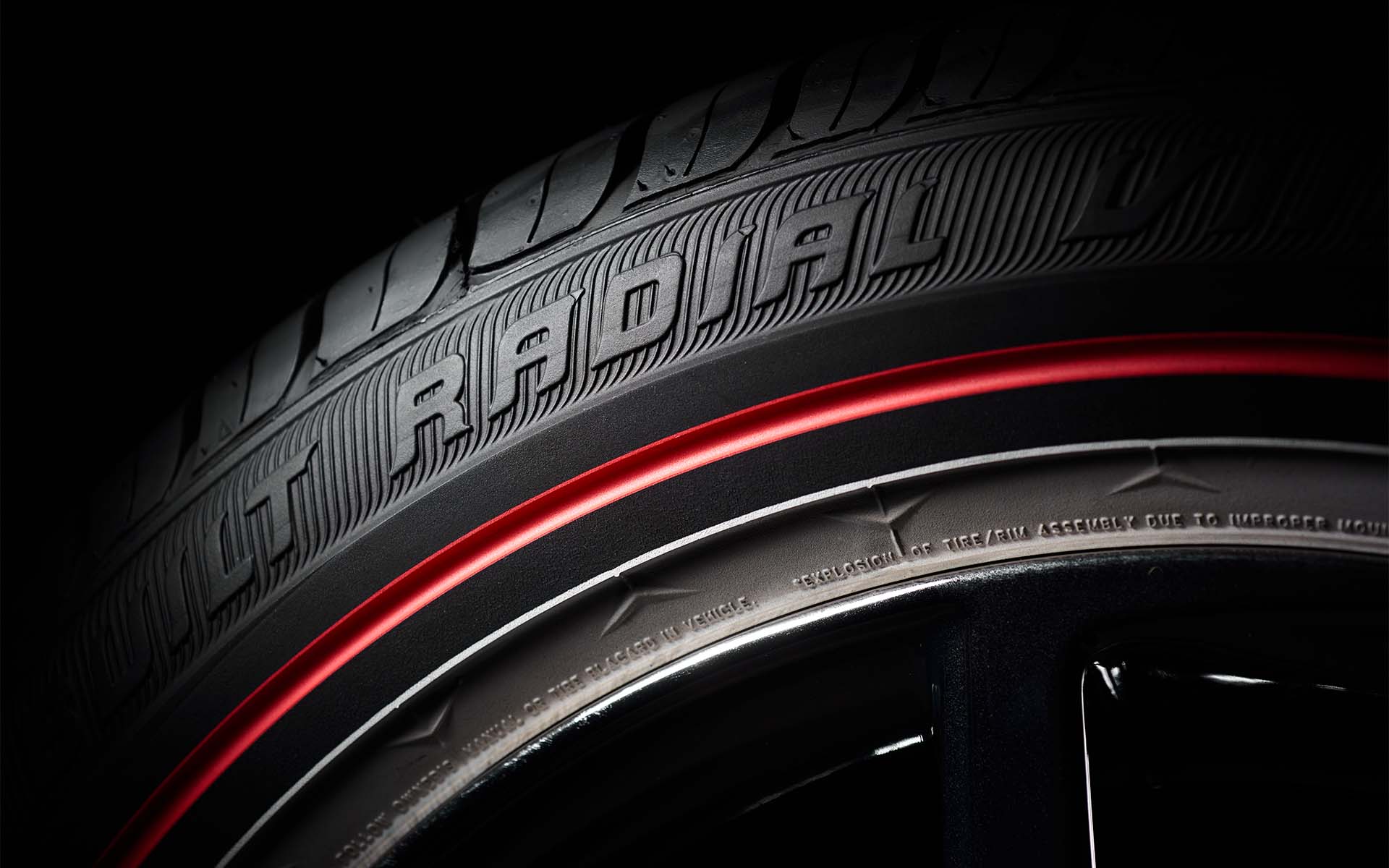 Custom Built Radial Red Stripe sidewall closeup