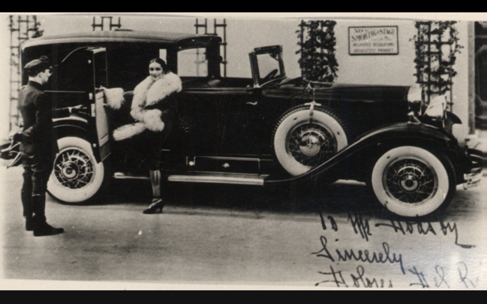 Actress Dolores del Río with Vogue Whitewall Tyres on her car.